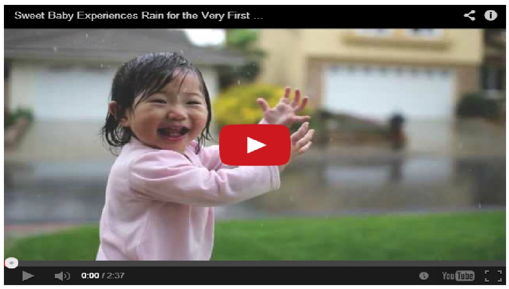 Sweet baby experiences rain for the very first time